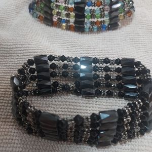 Two magnetic bracelets, convertible to lariats
